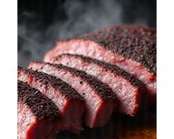 Texas style beef brisket with a dark peppery bark