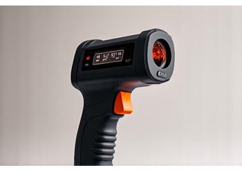 Ergonomic Infrared Temperature Gun with laser pointer for precise aiming.
